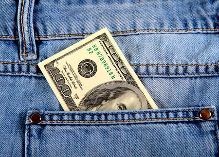 Hundred Dollars in the Pocket of the Jeans closeupの写真素材