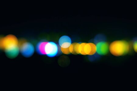 Defocused Bokeh Lights on the Black Backgroundの写真素材