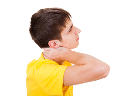 Teenager feels Neckache Isolated on the White Backgroundの写真素材