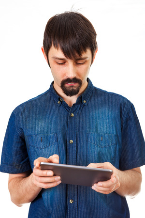 Man with Tablet Computer Isolated on the White Backgroundの写真素材