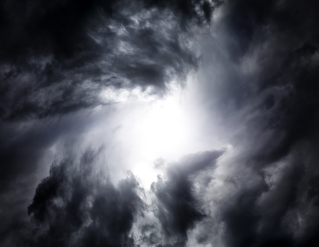 Blurred Swirl in the Dark Storm Clouds with Ray of the Light