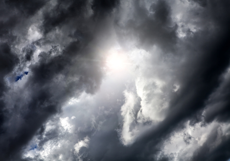 Light in the Dark and Dramatic Storm Clouds