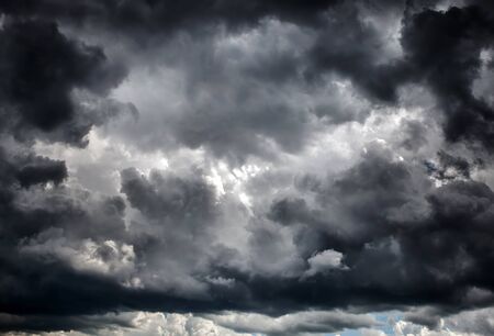 Dark and Dramatic Storm Clouds Area Backgroundの写真素材