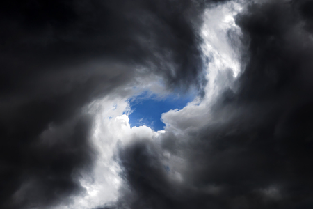 Blurred Swirl in the Dark Storm Cloudsの写真素材