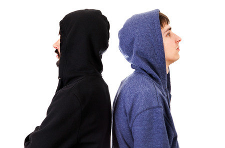 Guys Side View in a Hoodie on the White Backgroundの写真素材