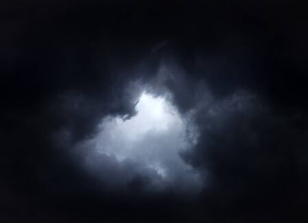 Dark and Dramatic Storm Clouds Area Backgroundの写真素材