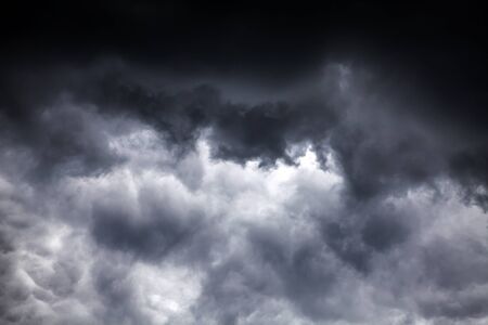 Dark and Dramatic Storm Clouds Area Backgroundの写真素材