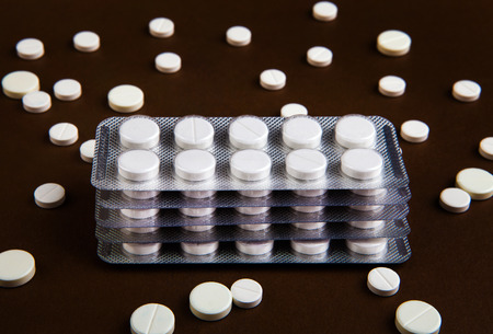 Pills Set on the Brown Paper Background closeupの写真素材