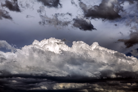 Dark and Dramatic Storm Clouds Area Backgroundの写真素材