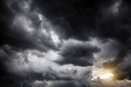 Light in the Dark and Dramatic Storm Clouds