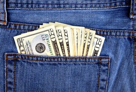 American Dollars in the Pocket of the Jeans closeup