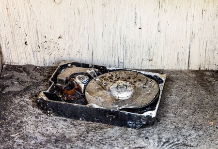 Broken Hard Disk Drive in the Old and Dirty Furniture