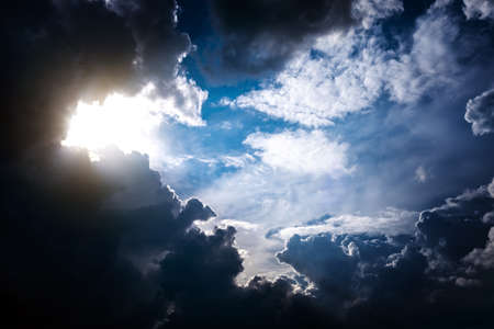 Light in the Dark and Dramatic Storm Cloudsの写真素材