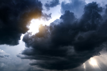 Light in the Dark and Dramatic Storm Cloudsの写真素材