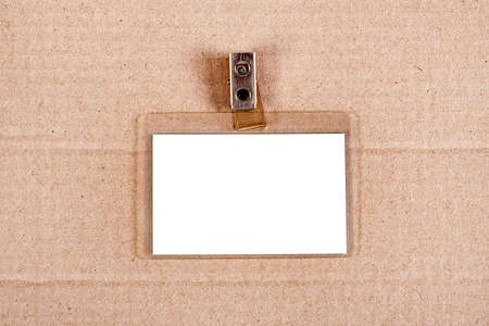 Blank Badge on the Cardboard Background closeupの写真素材