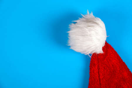 Santa Hat on the Blue Background closeupの写真素材