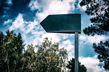 Guide Sign on thw Sky Background in the Park