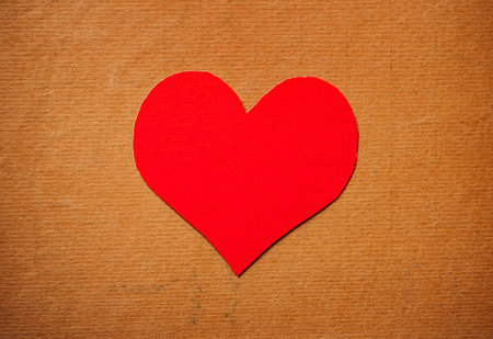 Red Heart Shape on the Old Paper closeupの写真素材