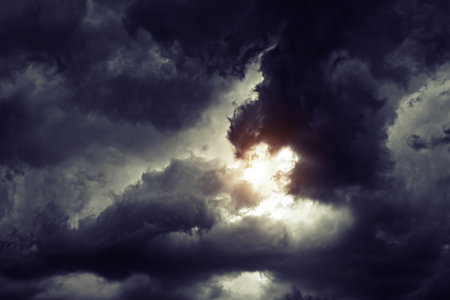 Stormy Rain Clouds Background with a Lightの写真素材