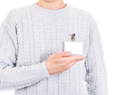 Person shows a Blank Badge with a Hand closeupの写真素材