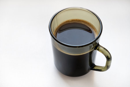 Coffee Mug on the White Table closeupの写真素材