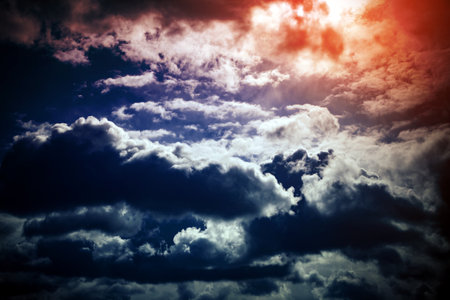Stormy Rain Clouds Background with a Lightの写真素材