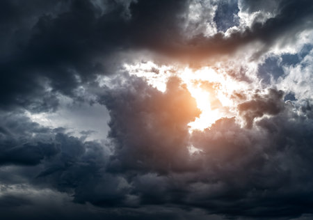 Stormy Rain Clouds Background with a Lightの写真素材