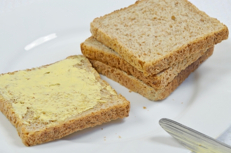 Toast und Butter auf Tellerの写真素材
