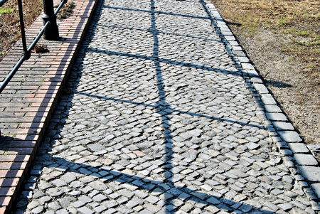 Light and Shadow on Pavement, close upの写真素材