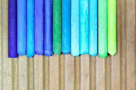 blue, green and cyan oil pastels, close upの写真素材