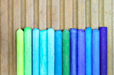 blue, green and cyan oil pastels, close upの写真素材