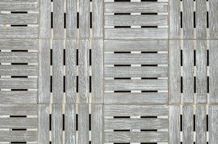 close up of small gray wooden pallets as a background pattern, full frame, flat lay, horizontalの写真素材