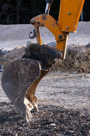 Close up of Excavator Bucket. Digging machinery parts, industry detail of bulldozer shovel....