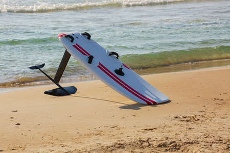 Kite surfing on the sand in the background of beautiful sea. Kiteboarding, surfboard, water sport. Healthy Active Lifestyle. Surfing. summer vacation. extreme sport. Copy space for your text, close upの写真素材