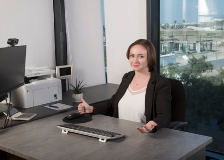 Happy web designer look camera show thumb up. Positive lady lawyer secretary show thumb up sign...