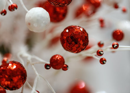 Blur background of Christmas red and white baubles. Christmas ornaments, blurred background with balls, toys and space for text. decoration bauble on Christmas decoration. Ball with lights sparklingの写真素材