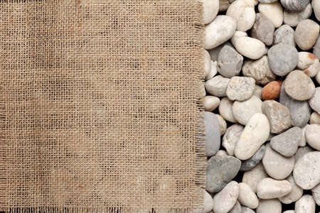 texture of  Burlap fray on the river rockの写真素材