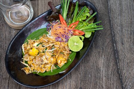 Pad Thai Thailand food on wood tableの写真素材