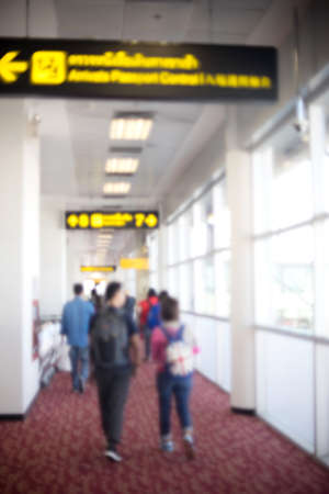 Blur people walking in airport station terminalの写真素材