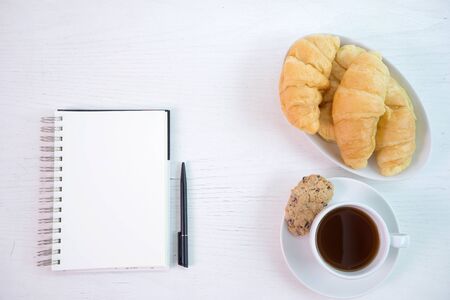 croissant cup coffee white  table top view more copy space