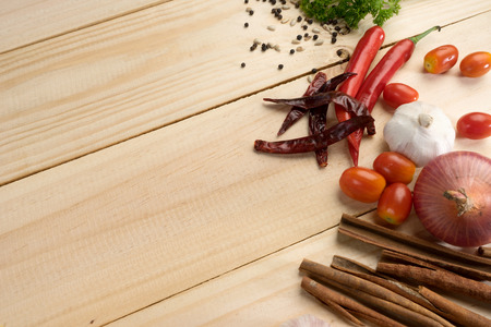 wood background onion spaghetti vegetable raw cookingの写真素材