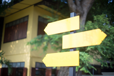 blank yellow guide post blur yellow houseの写真素材