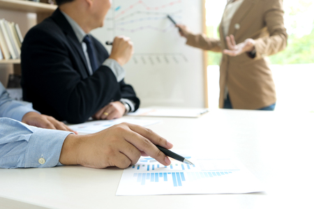 presentation in business group meeting show chart graph on boardの写真素材