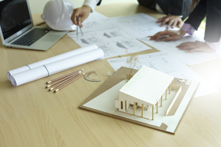 architect or engineer working on table show work hand for business projectの写真素材