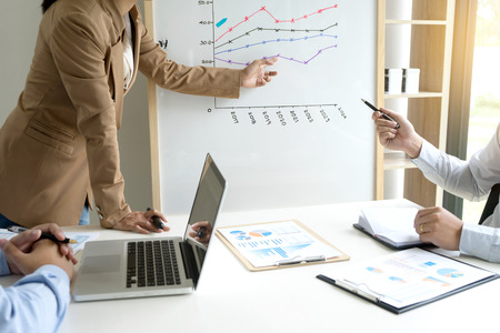 presentation in business group meeting show chart graph on boardの写真素材
