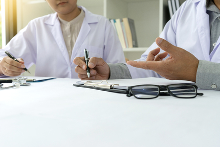 Two doctor talking and consult about healtcare and medicine  techonlogyの写真素材