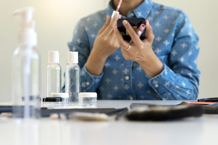 woman present beauty product and broadcast live video to social network by internet concept beauty...