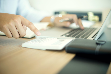 Business man work out of office use computer laptop for business plan  company or freelanceの写真素材