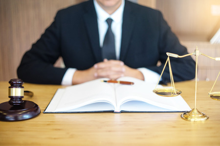 lawyer or  judge work in the office with gavel and balanceの写真素材