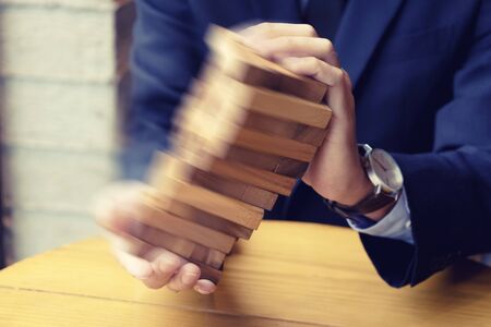 business concept plan and risk project business team work image by Wood block tower with architecture model の写真素材